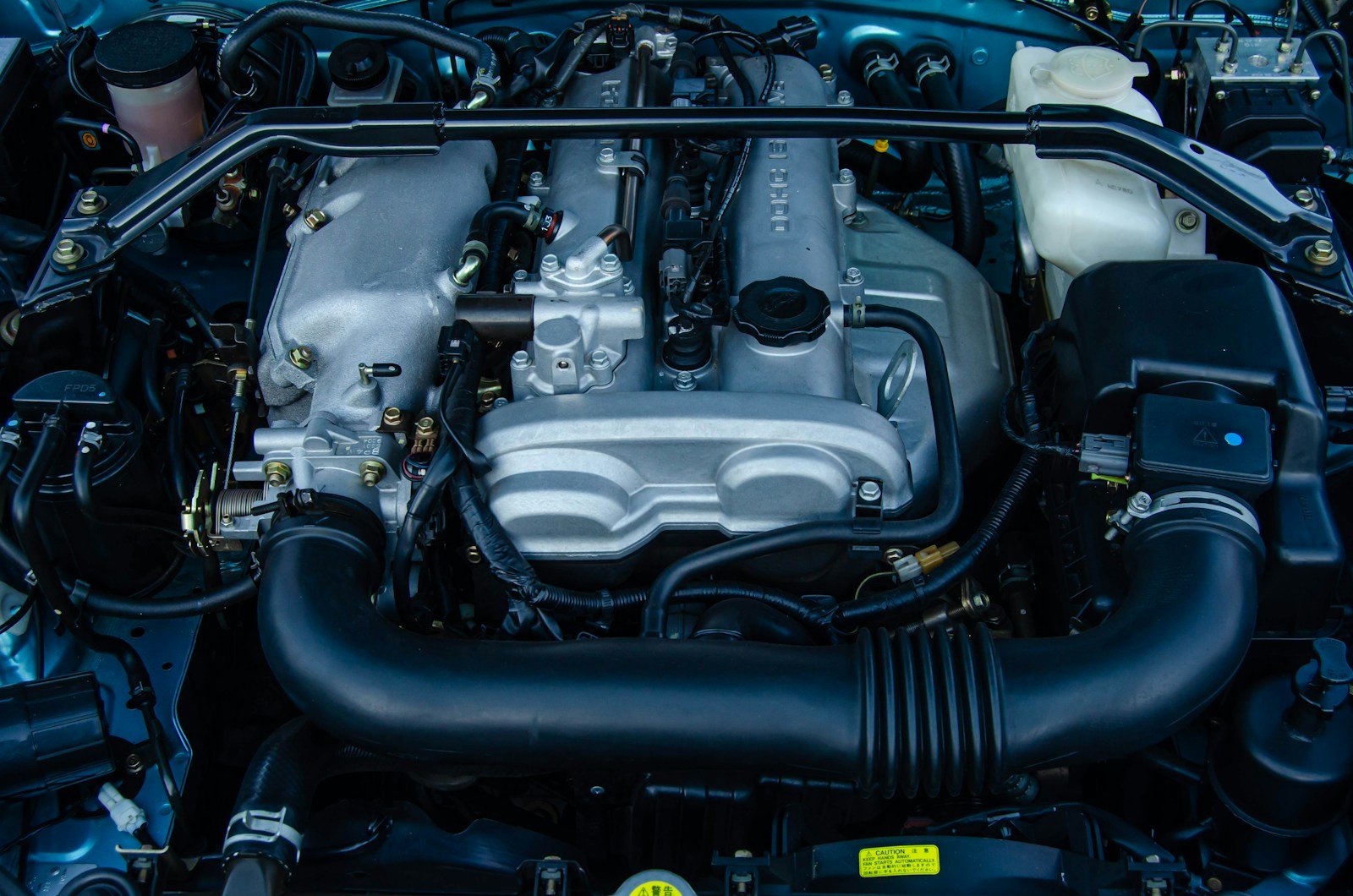 a car engine with its hood open